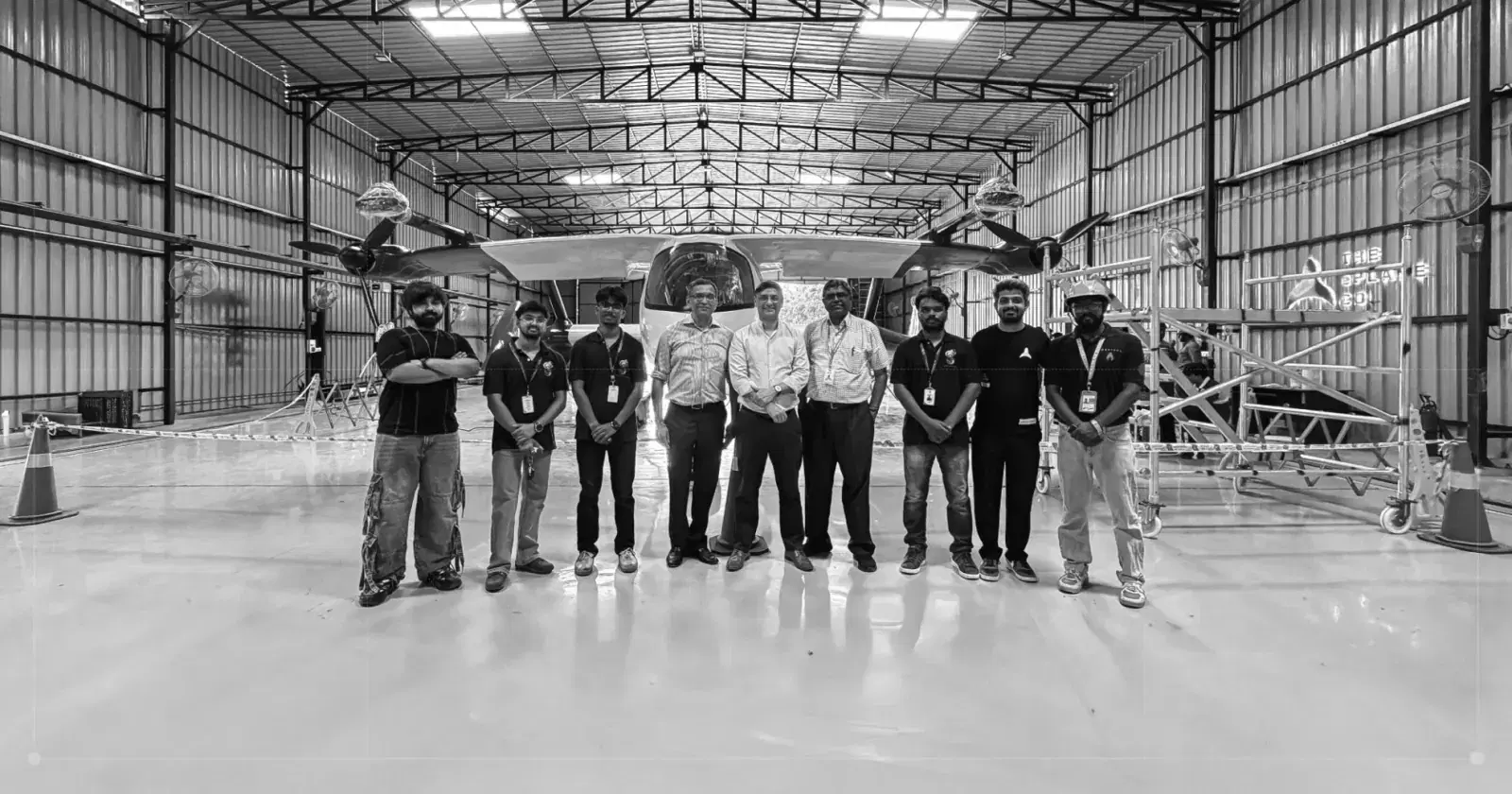 The team in front of the completed e200X prototype in ground testing